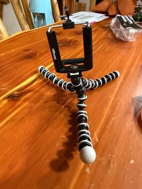 Billboard cell phone stand